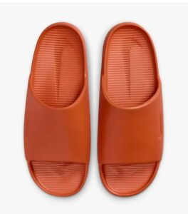 Nike Calm Orange Slides front